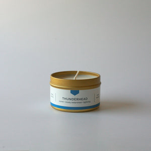 
                  
                    THUNDERHEAD Gold Travel Tin Soy Candle - Ozone and Mossy Cedarwood, Hand-Poured (4 oz)
                  
                