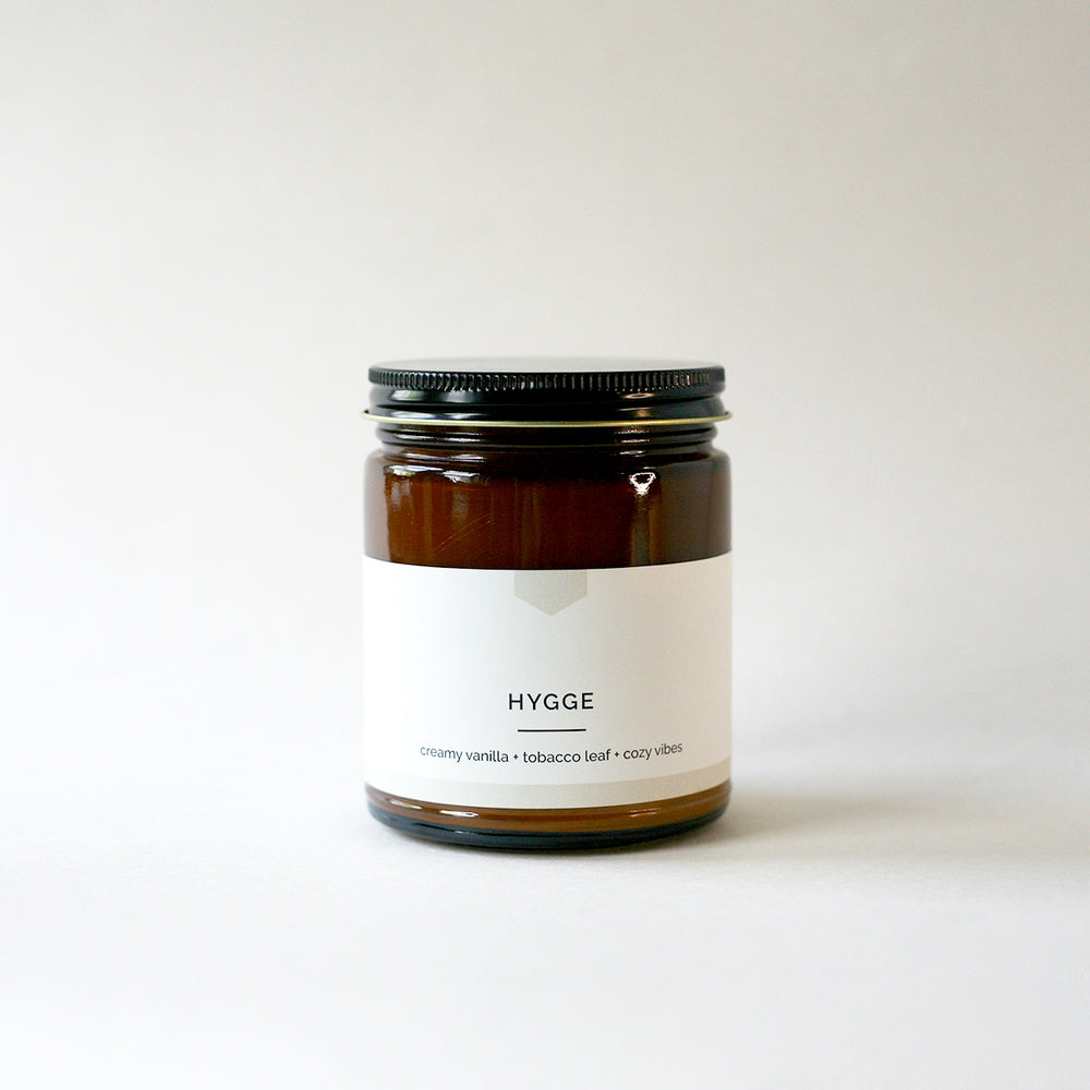 HYGGE 9 oz Amber Glass Soy Candle - Vacant Wheel
